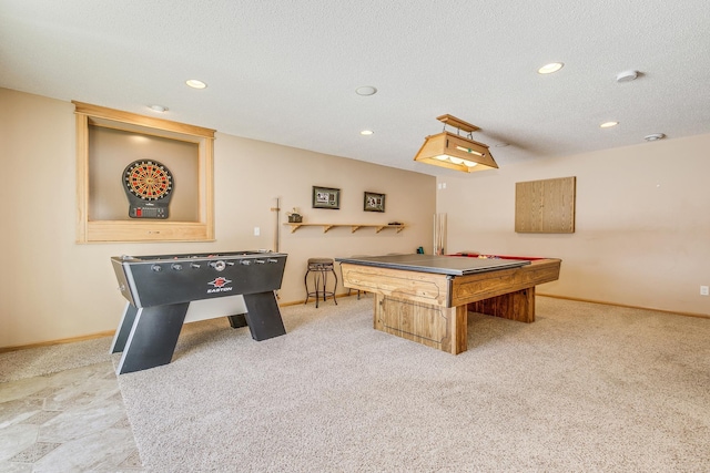 playroom with recessed lighting, baseboards, and a textured ceiling