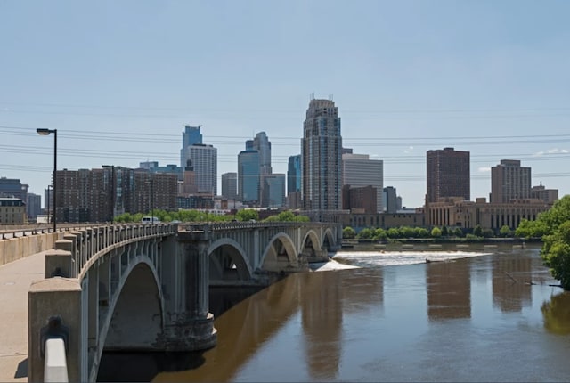 property's view of city with a water view