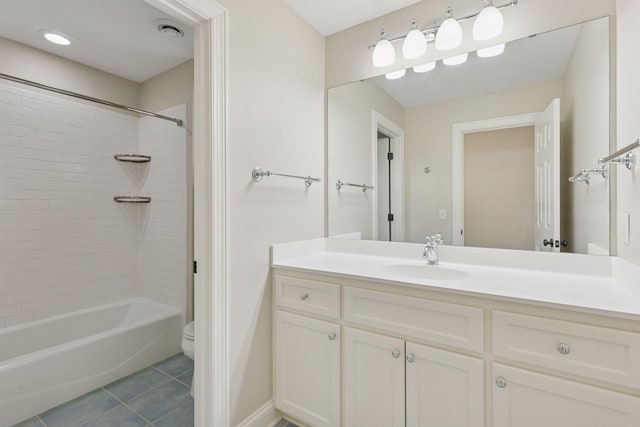 bathroom with tile patterned floors, visible vents, toilet, bathing tub / shower combination, and vanity