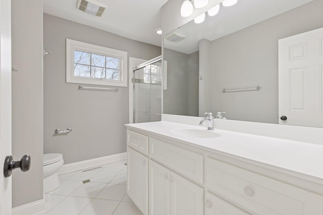 full bathroom featuring vanity, baseboards, visible vents, a stall shower, and toilet