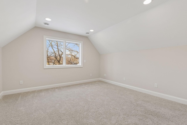 bonus room featuring carpet flooring, recessed lighting, baseboards, and vaulted ceiling