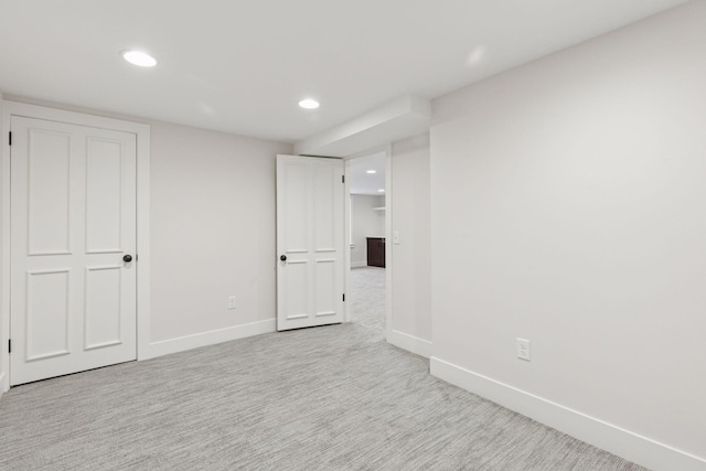 interior space with recessed lighting, baseboards, and carpet