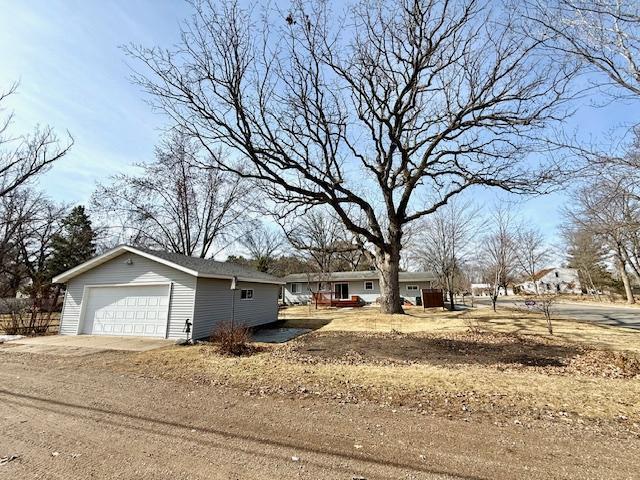 view of front of house with a garage and driveway