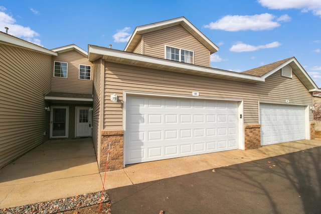 traditional home featuring driveway