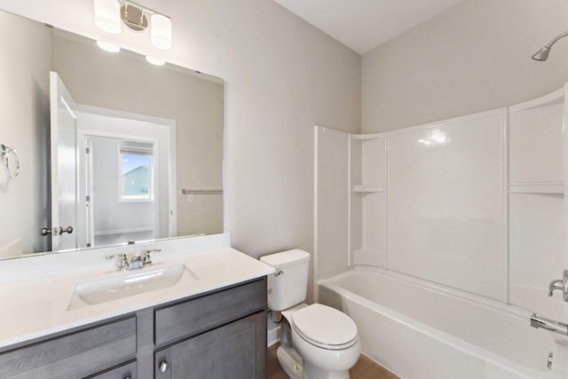 full bath with toilet, bathing tub / shower combination, and vanity
