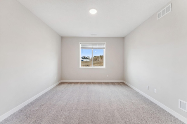 1332 Rose St, New Richmond, WI 54017 - empty room with light carpet and baseboards