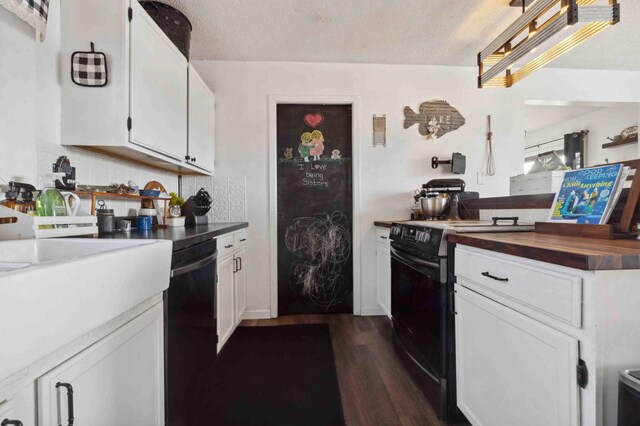 kitchen featuring white cabinets, a textured ceiling, black appliances, and dark wood-type flooring