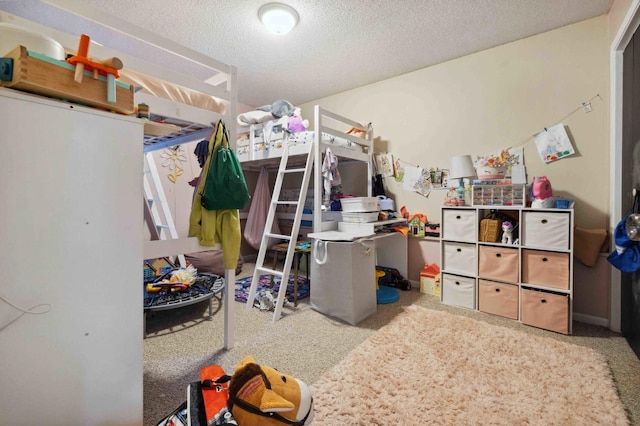 carpeted bedroom featuring a textured ceiling