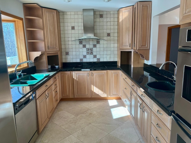 kitchen featuring open shelves, stainless steel appliances, wall chimney exhaust hood, and a sink