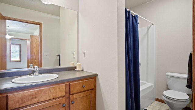 full bath with toilet and vanity