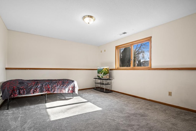 bedroom with visible vents, baseboards, and carpet