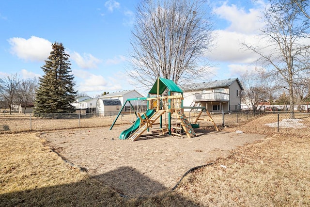 view of playground featuring fence