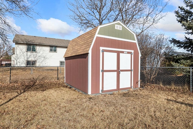 view of shed featuring a fenced backyard