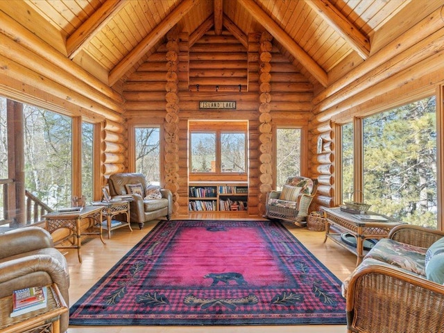 sunroom / solarium with wood ceiling and vaulted ceiling with beams