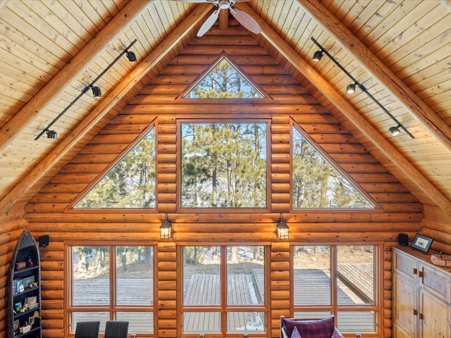 details featuring wooden ceiling, beamed ceiling, and rail lighting