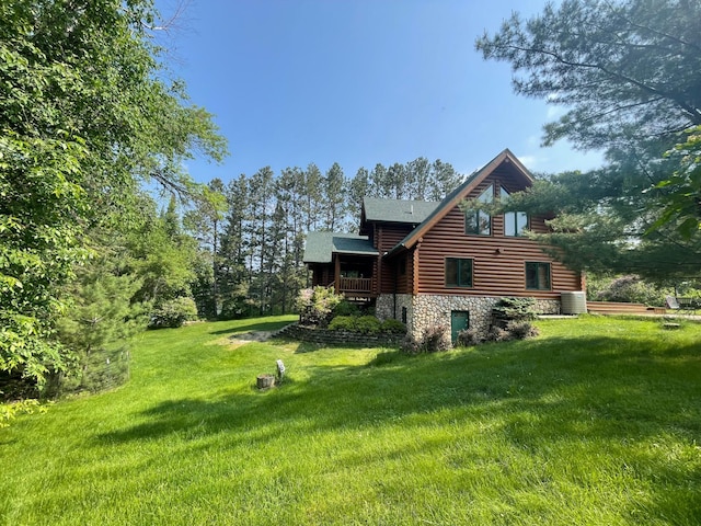 11766 Island Shore Ln, Park Rapids, MN 56470 - view of side of property featuring stone siding, a lawn, and roof with shingles