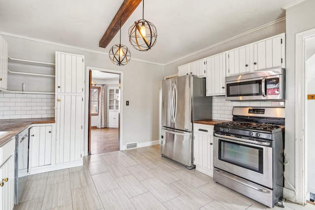 kitchen featuring visible vents, beam ceiling, open shelves, stainless steel appliances, and white cabinetry