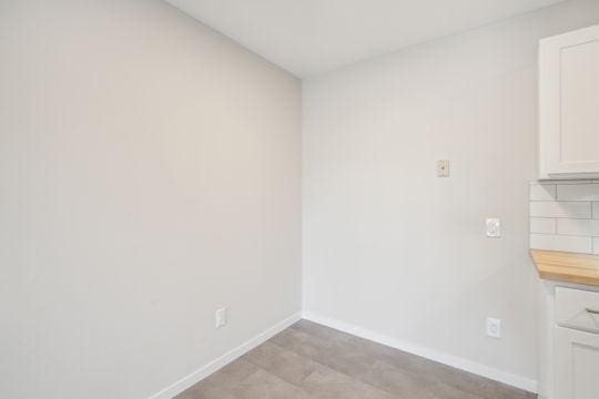 interior space featuring baseboards