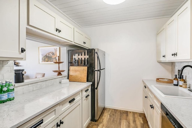 kitchen with stainless steel appliances, backsplash, wooden ceiling, a sink, and light wood-type flooring