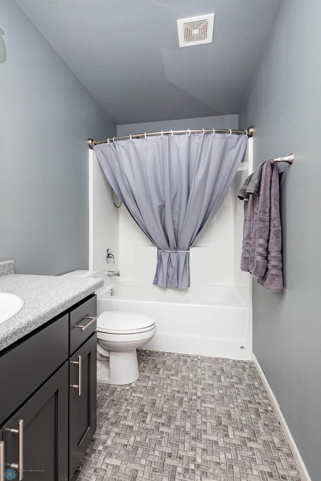 bathroom featuring vanity, shower / bathtub combination with curtain, baseboards, visible vents, and toilet