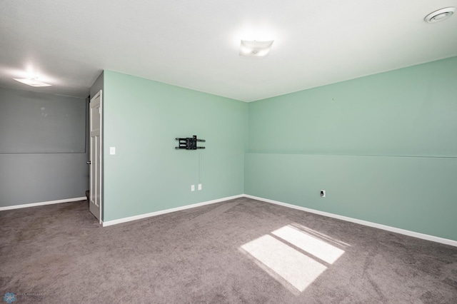 unfurnished bedroom with carpet and baseboards