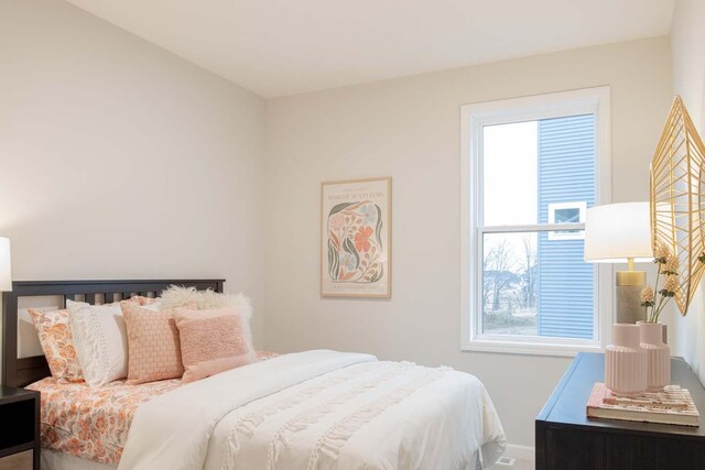 bedroom featuring baseboards