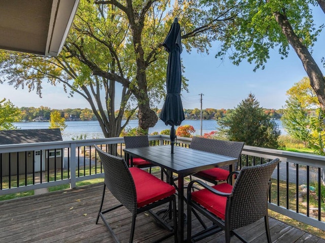 wooden deck with outdoor dining area