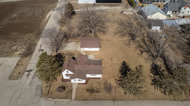 birds eye view of property with a residential view