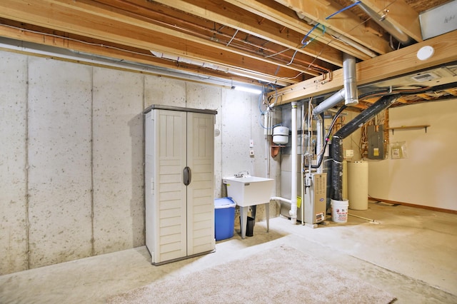 unfinished basement featuring electric panel, heating unit, and a sink