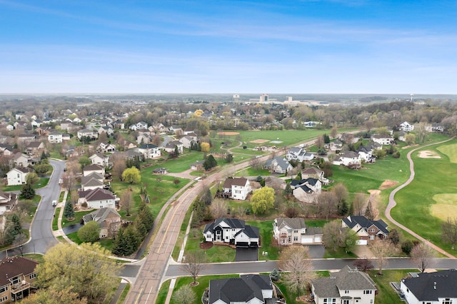 birds eye view of property featuring a residential view and golf course view