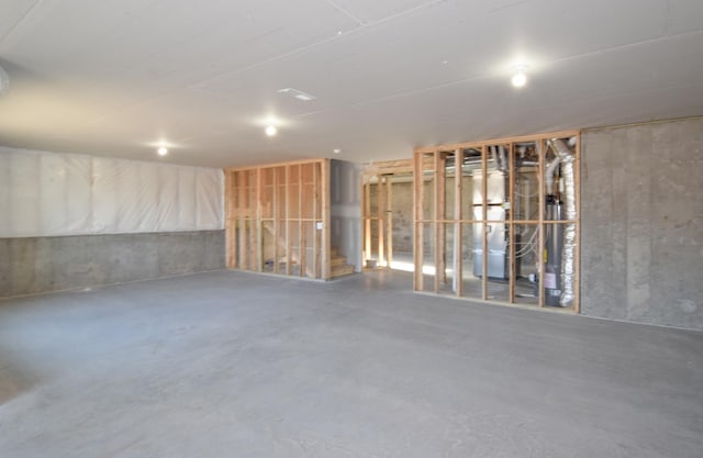 unfinished basement with stairway