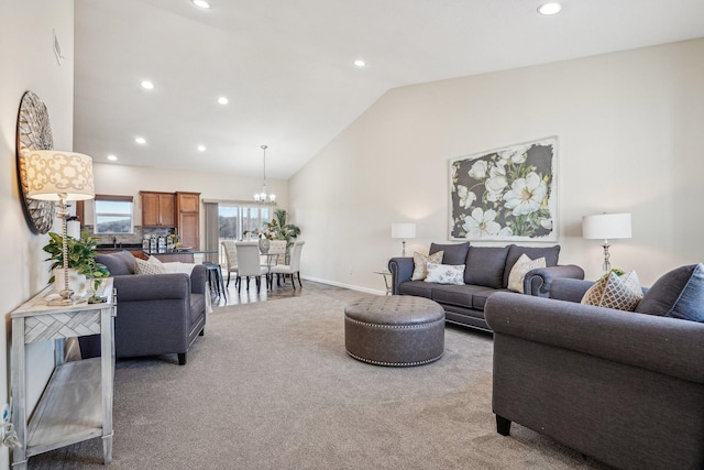 carpeted living area with recessed lighting, an inviting chandelier, high vaulted ceiling, and baseboards