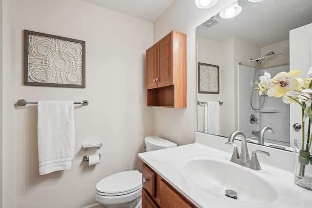 full bathroom with a shower, visible vents, toilet, and vanity