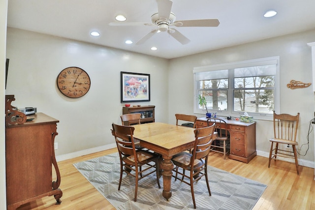 dining space with a ceiling fan, recessed lighting, light wood-style floors, and baseboards