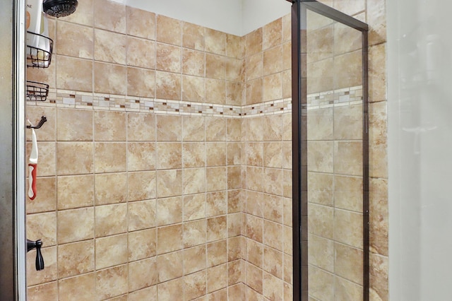 bathroom featuring a shower stall