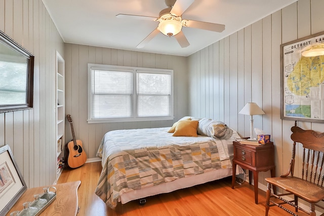 bedroom featuring a ceiling fan and light wood-type flooring