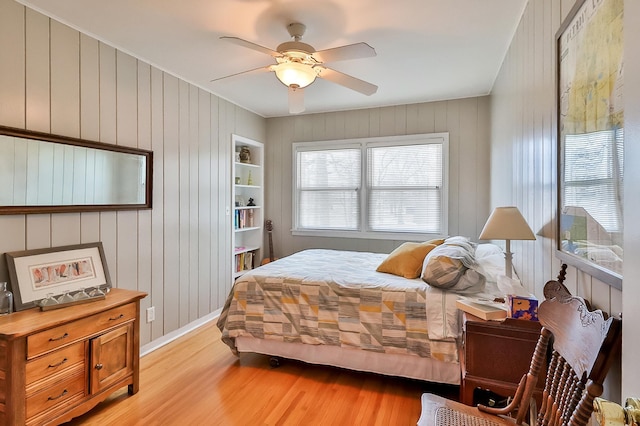 bedroom featuring light wood-type flooring and ceiling fan