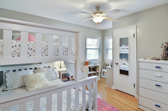 bedroom with light wood finished floors