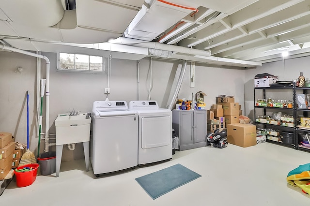 below grade area featuring separate washer and dryer