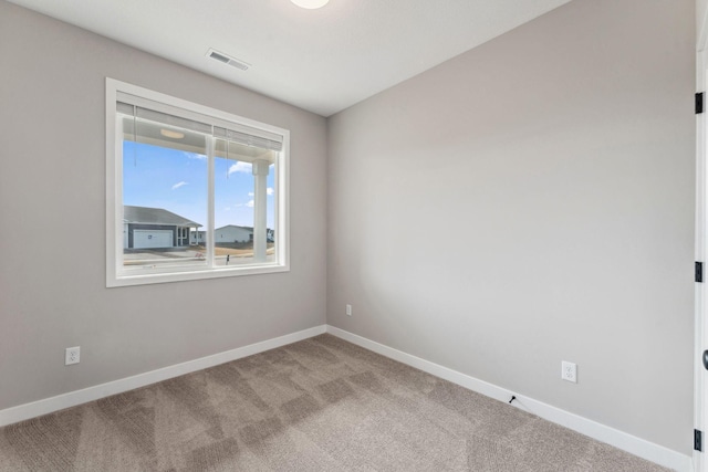 1330 Rose St, New Richmond, WI 54017 - carpeted empty room with baseboards
