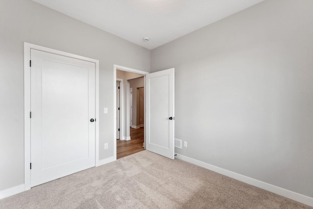1330 Rose St, New Richmond, WI 54017 - unfurnished bedroom with carpet and baseboards