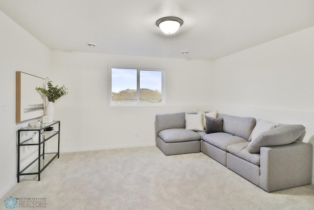 living area with carpet flooring and baseboards