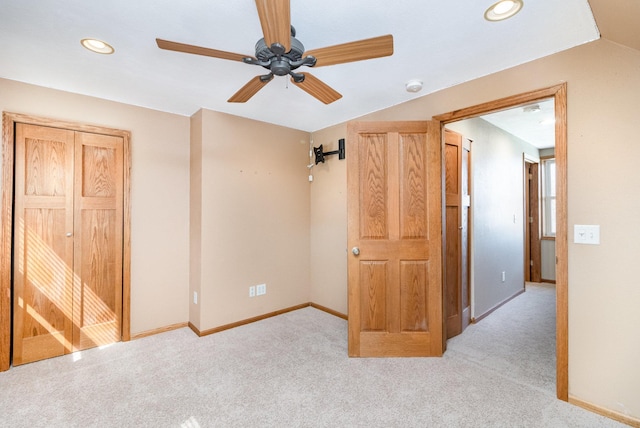 spare room featuring baseboards, recessed lighting, a ceiling fan, and carpet