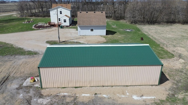 view of basketball court with a lawn