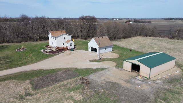 birds eye view of property featuring a rural view