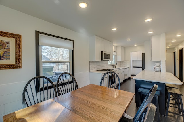 1109 Saint Croix Hts, Hudson, WI 54016 - dining area featuring plenty of natural light, recessed lighting, and dark wood finished floors