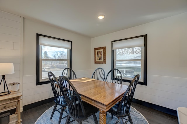 1109 Saint Croix Hts, Hudson, WI 54016 - dining space featuring healthy amount of natural light, dark wood finished floors, and wainscoting