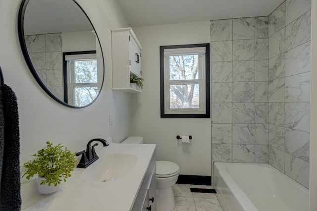 1109 Saint Croix Hts, Hudson, WI 54016 - full bathroom with marble finish floors, toilet, baseboards, vanity, and plenty of natural light
