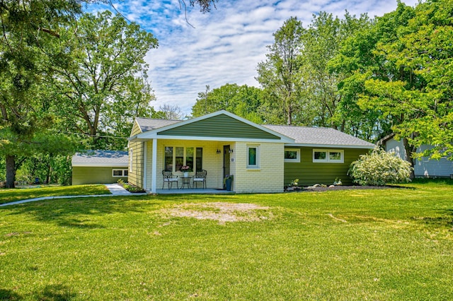 1109 Saint Croix Hts, Hudson, WI 54016 - view of front facade featuring a front lawn and roof with shingles
