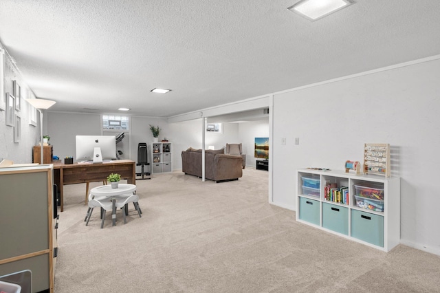 playroom featuring baseboards, carpet floors, and a textured ceiling